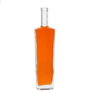 China 700ml clear trapeziod shape glass alcohol bottles Manufacturer and Company | QLT