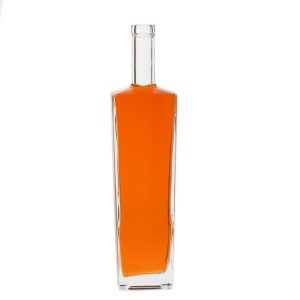 China 700ml clear trapeziod shape glass alcohol bottles Manufacturer and Company | QLT