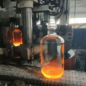 China 700ml 750ml Pacho Extra Flint Cylindrical Round Glass Bottle for Liquor Manufacturer and Company | QLT