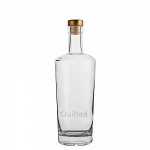 China 700 ml round shape liquor glass vodka bottle Manufacturer and Company | QLT