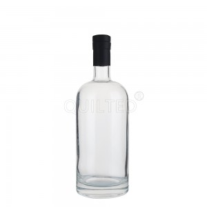China Clear 700 ml round liquor glass vodka bottle with lid Manufacturer and Company | QLT