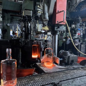 China 750ml Glass Aspect Liquor Bottles Manufacturer and Company | QLT