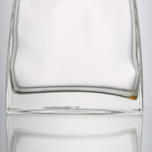 China unique clear glass 700 ml flat shape liquor bottle Manufacturer and Company | QLT