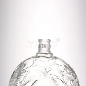 China 300 ml embossed glass bottle for whisky and liquor with lid Manufacturer and Company | QLT