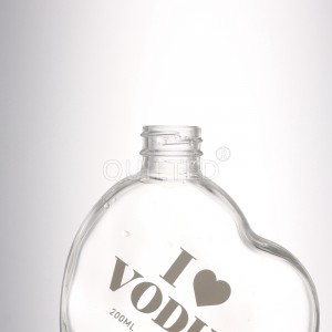 China 200 ml heart-shaped clear liquor glass bottle Manufacturer and Company | QLT