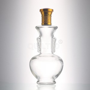 China 600 ml Magic lamp shape clear liquor glass whisky bottle Manufacturer and Company | QLT