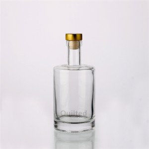 China Fancy 750 ml liquor color glass bottle with cork Manufacturer and Company | QLT