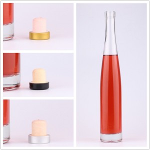 China custom clear liquor 500 ml glass bottle with cork Manufacturer and Company | QLT