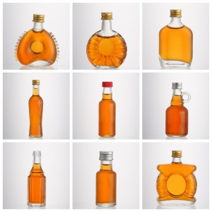 China Mini size liquor 50 ml glass vodka bottle with screw Manufacturer and Company | QLT